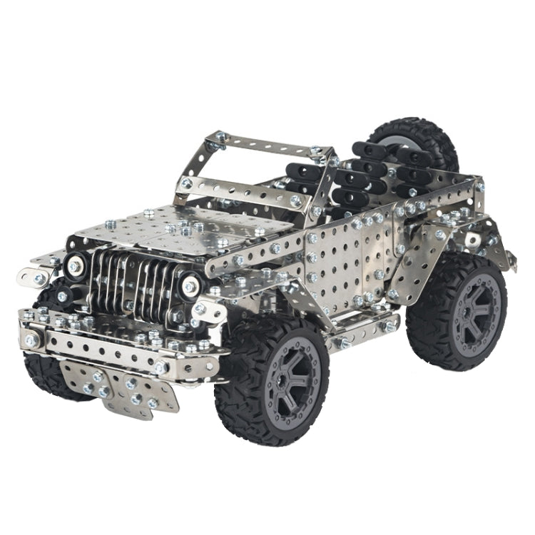 Metal off-road vehicle model toy with silver frame and black tread tires, 3/4 front view