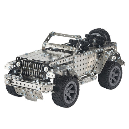 Metal off-road vehicle model toy with silver frame and black tread tires, 3/4 front view