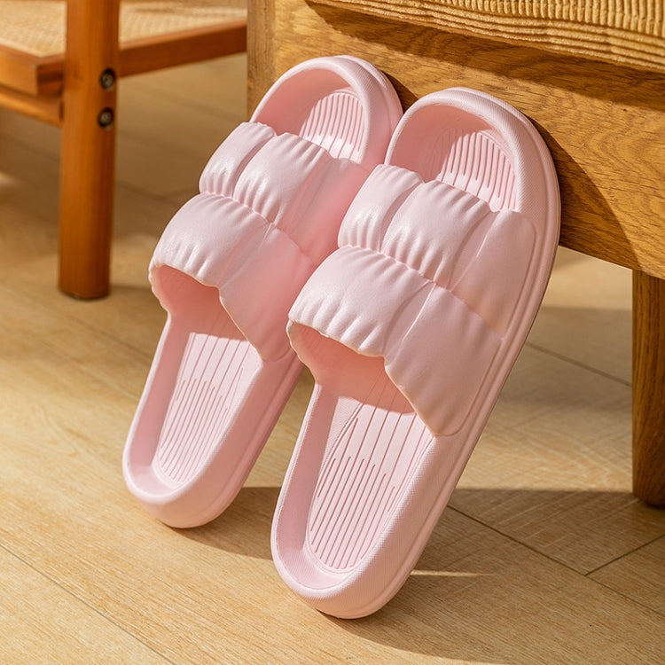 Pink EVA couple slippers, slip-on with ribbed insole texture and grippy sole, pair
