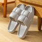 White EVA slide slippers, padded crossover straps and ridged insole with thick sole