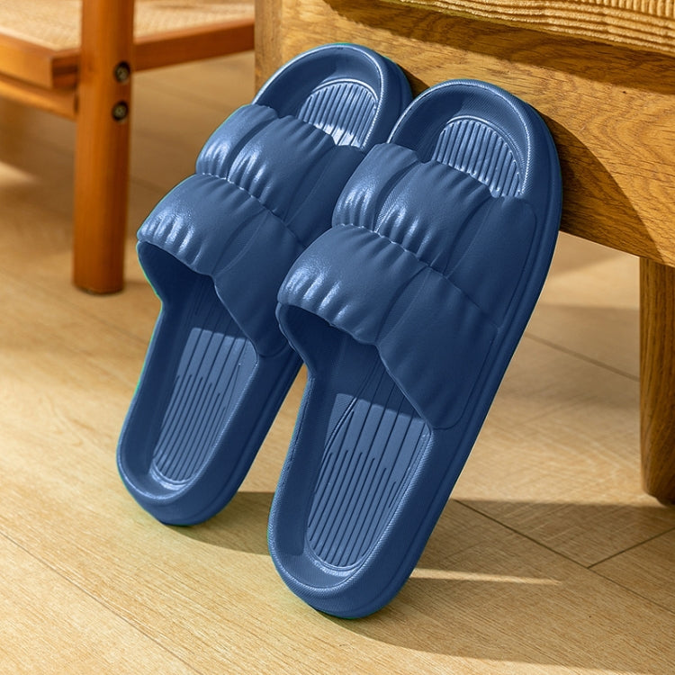 Navy-blue EVA slide slippers, front pair view with ribbed insole and grippy sole