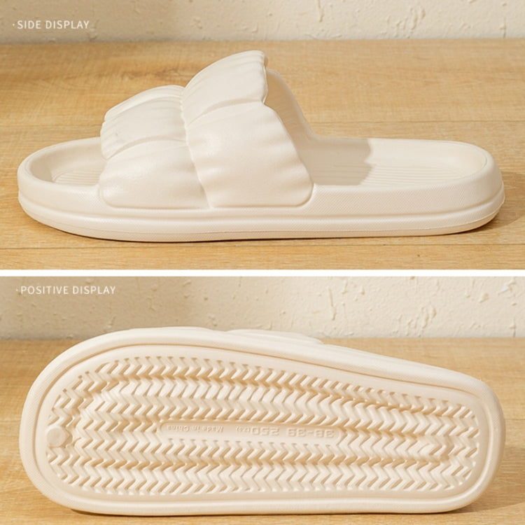 White EVA slide slippers with grooved outsole tread, slide-on comfort design