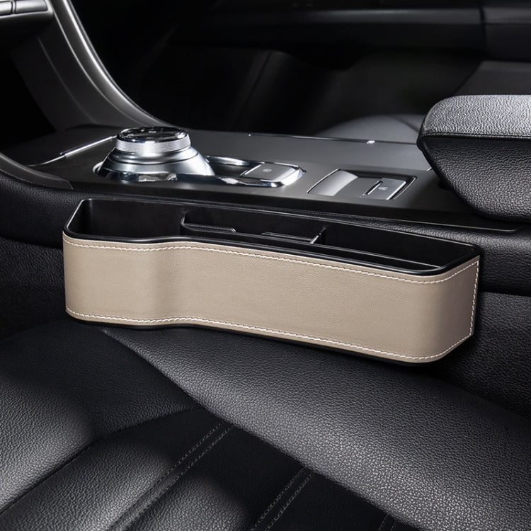 Car seat crevice storage box with lid, beige leather finish and white contrast stitching