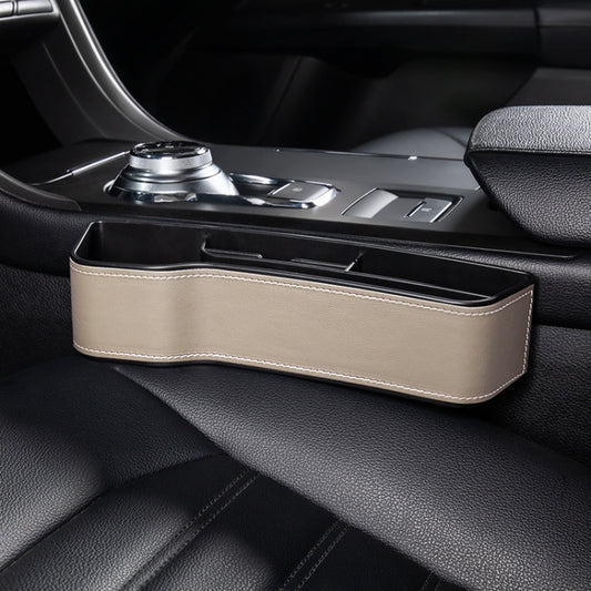 Car seat crevice storage box with lid, beige leather finish and white contrast stitching