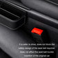 Black leather-look seat storage box with stitched rim and open compartment