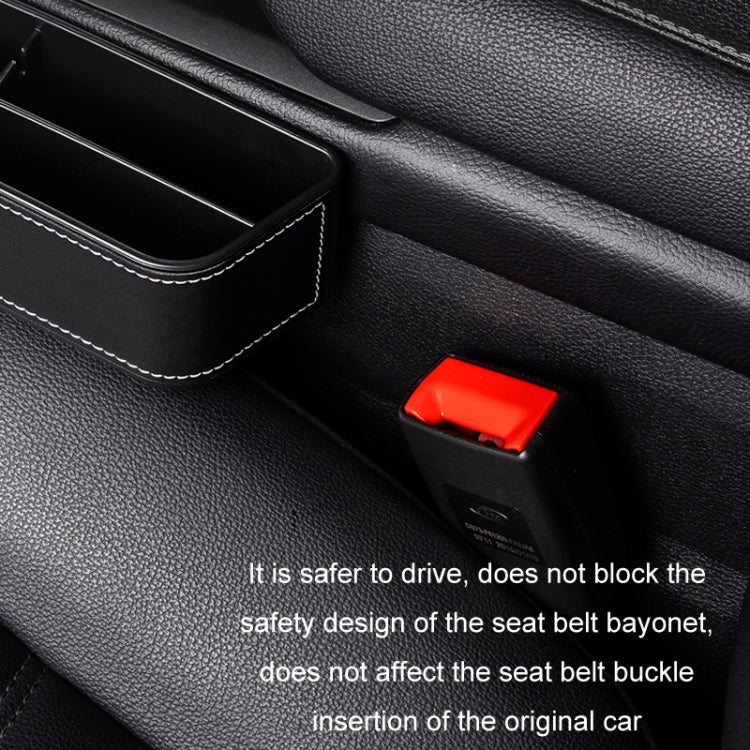 Black leather-look seat storage box with stitched rim and open compartment