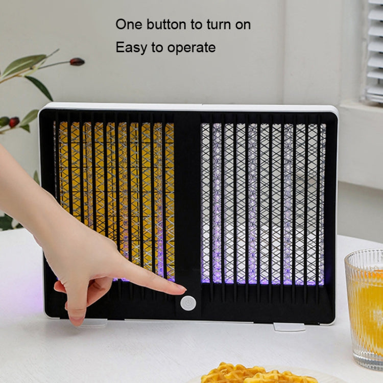 Mosquito killer lamp with on/off button on front base and dual glowing UV grids