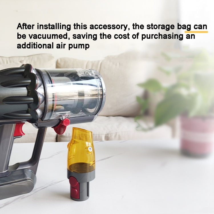 Yellow vacuum suction tip adapter connected to vacuum for bag vacuuming