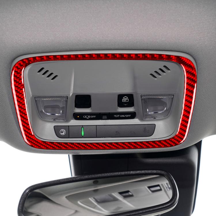 Red carbon-fiber reading light frame trim sticker installed on car overhead console