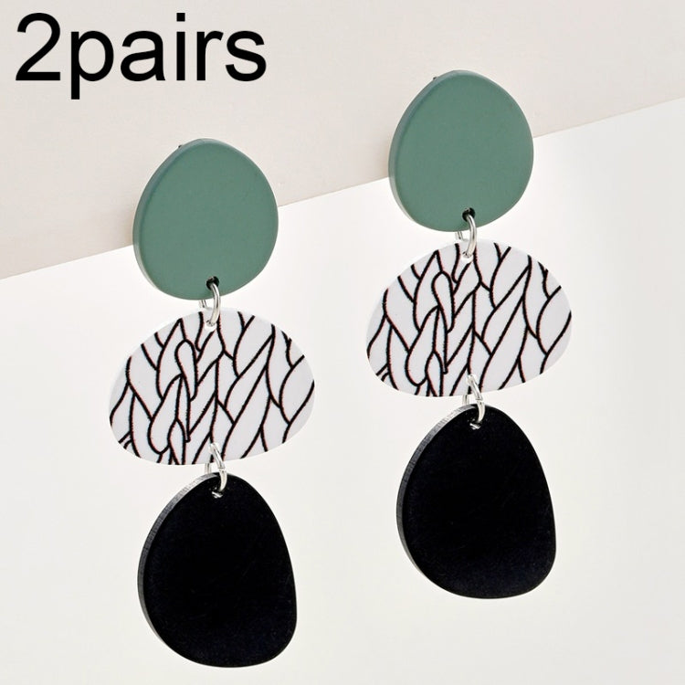 Long dangle earrings with teal round tops and black patterned oval drops