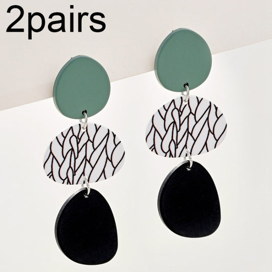 Long dangle earrings with teal round tops and black patterned oval drops