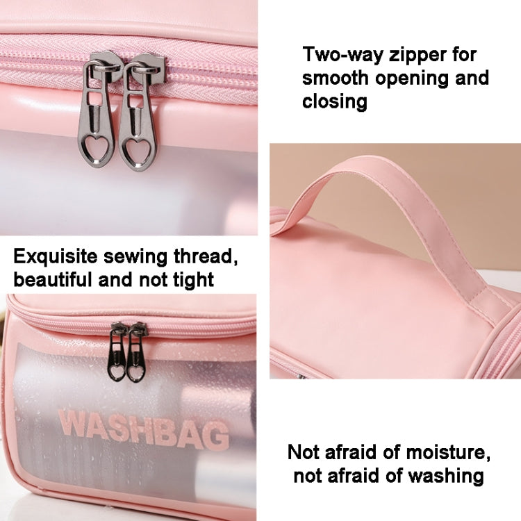 Pink frosted cosmetic bag close-up with double zipper pulls and stitched trim