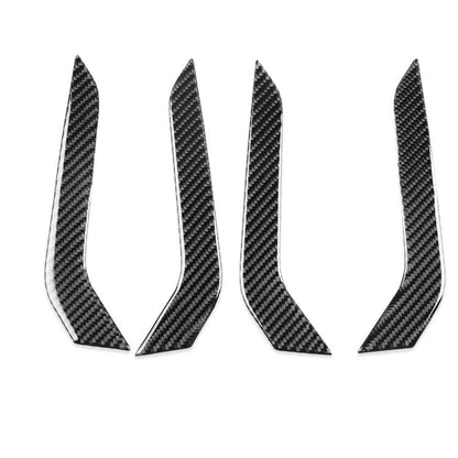 Set of four black carbon-fiber style door armrest decorative stickers, left-hand drive.