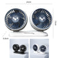 Compact double-head car fan with two round fan grilles on a white base stand