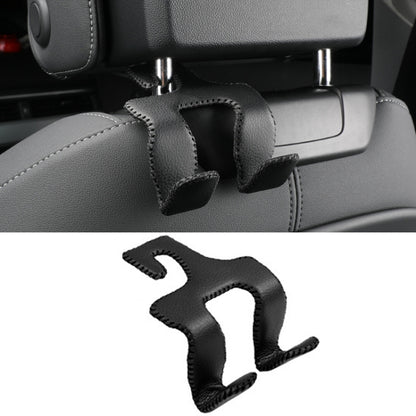 Car headrest double hook holder, black leather-wrapped straps with mounting prongs