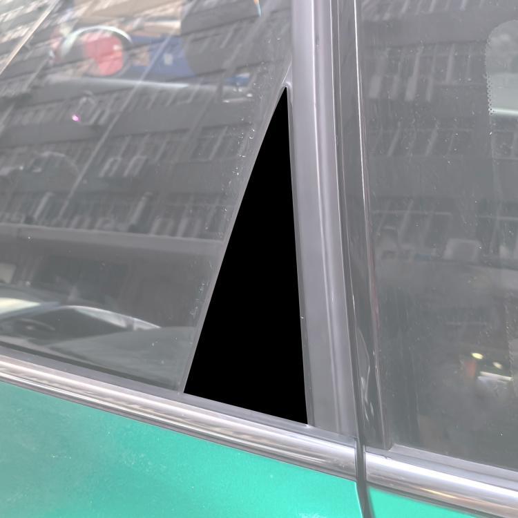 Close-up of black B-pillar decorative sticker strip on car door frame