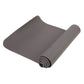 Gray rolled yoga mat with textured grip surface