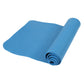 Blue rolled yoga mat with textured grip surface