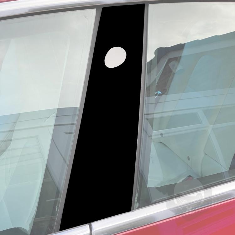 Close-up of black B-pillar decorative sticker with round white cutout