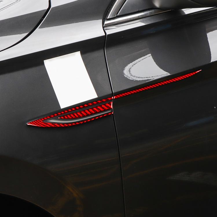 Red carbon-fiber fender stripe sticker applied on car body trim