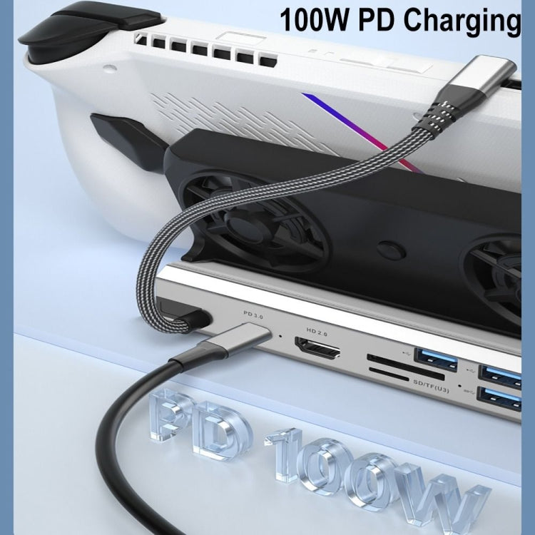 Close-up of white docking station with PD charging and front USB ports