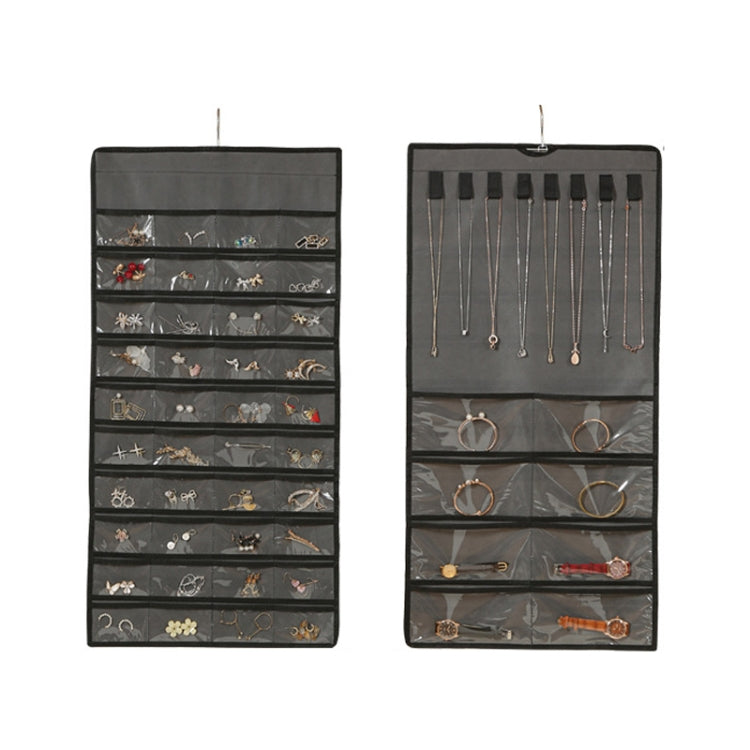 Dark gray double-sided hanging jewelry organizer bag with clear grid compartments
