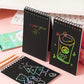 Small black scratch art cards with spiral binding and colorful neon doodles