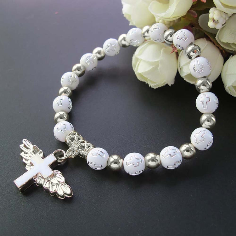 Silver-tone bead angel cross bracelet with gold spacers and angel cross charm.