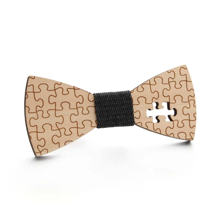 Wooden bow tie with puzzle-piece pattern, black fabric center, tan wooden wings