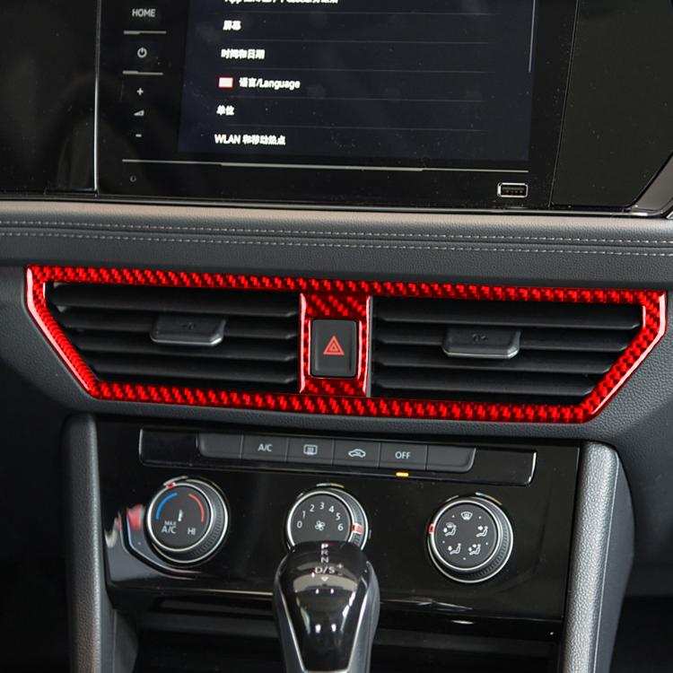 Red carbon-fiber air outlet trim sticker installed around center vents with center tab