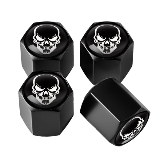 Set of 4 black metal tire valve caps with skull emblem, hex-style design