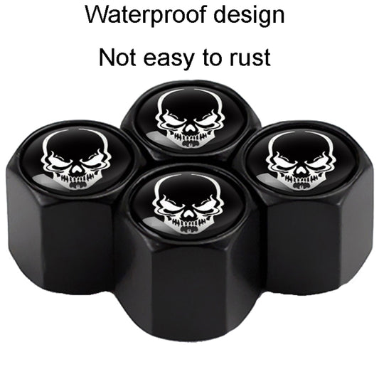 Set of 4 black hex tire valve caps with white skull graphics