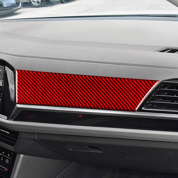 Red carbon-fiber style dashboard instrument sticker strip on car interior trim