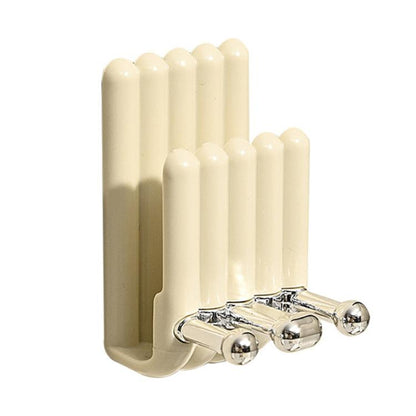 Wall-mounted toothbrush cup holder with cream slots and chrome double hooks.