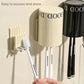 Wall toothbrush organizer with cream cups, white brush holder, and chrome mounting hardware.