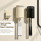 Wall-mounted toothbrush cup holder with cream and black cups and two chrome hooks.