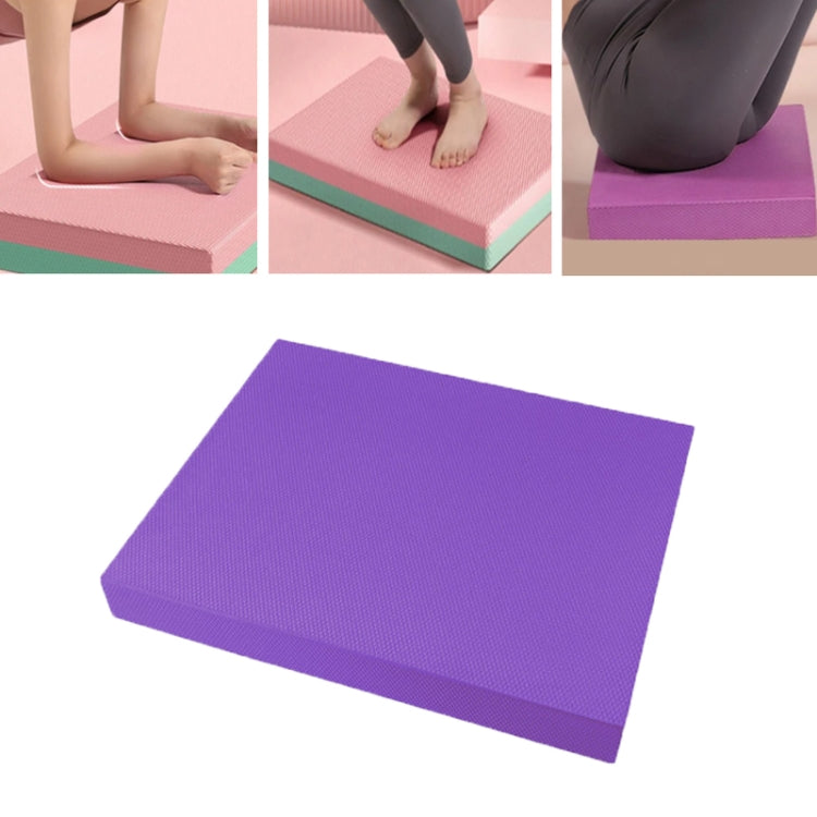 Purple flat non-slip balance mat for kneeling and floor exercise.