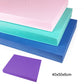 Stacked balance mats in teal, blue, and purple with textured non-slip surface.
