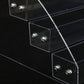 Transparent acrylic nail polish rack close-up of tier supports and knobs