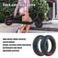 Pair of off-road scooter tires, black tread with blue and yellow accent stripes