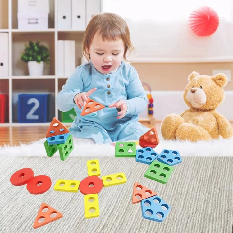 Children's colorful geometric shape matching building blocks set on floor