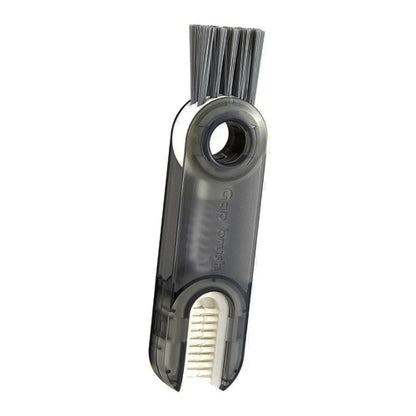 Gray U-shaped cup lid cleaning brush with stiff bristles and curved inner head