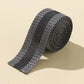 Iron-on pant leg tape stickers, black roll showing dotted lattice stripe pattern