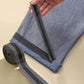 Iron-on pant leg tape stickers, dark gray strip placed along fabric edge with roll