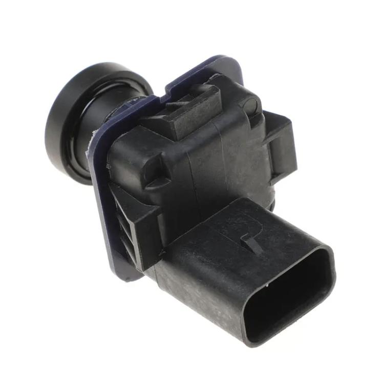Reversing assist camera sensor with black connector plug and circular lens
