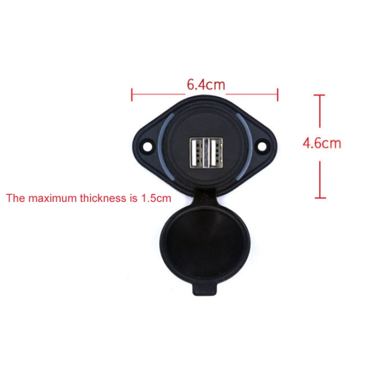 Dual USB car charger module with two USB ports and circular cap, black with blue accent.