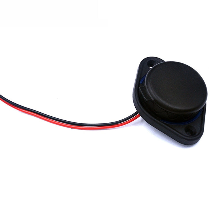 Dual USB car charger with hinged cover and connected wires, black.