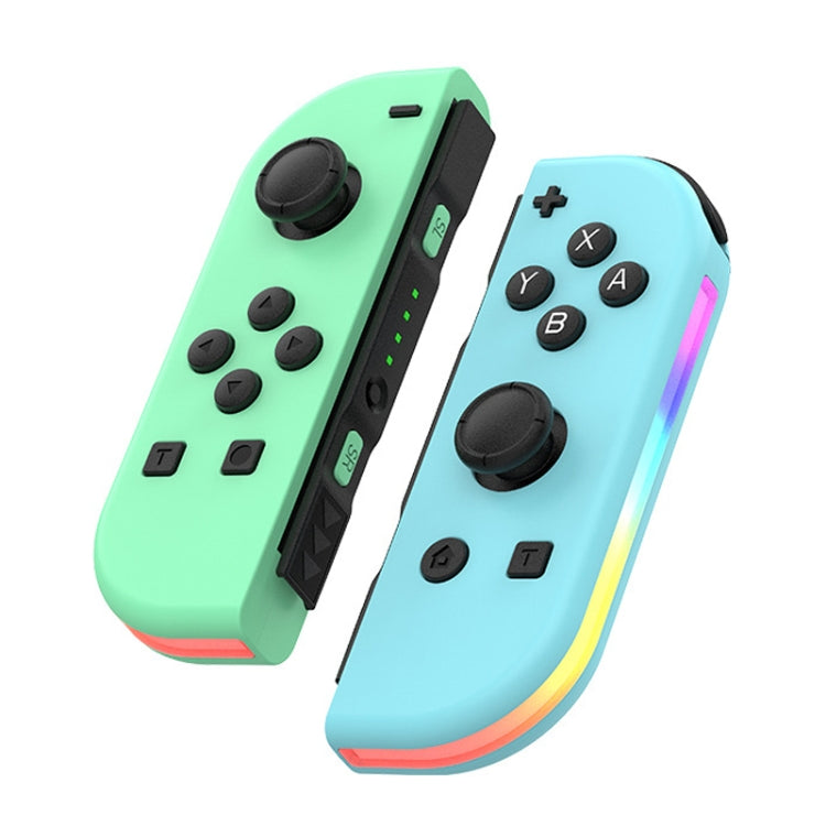 Mint and light blue left-right game controller set with twin thumbsticks and RGB light bar.