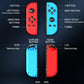 Close-up of red and blue left-right controller halves with face buttons and thumbsticks.