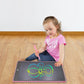 Children's LCD writing board, pink frame, kid using stylus with colorful drawing